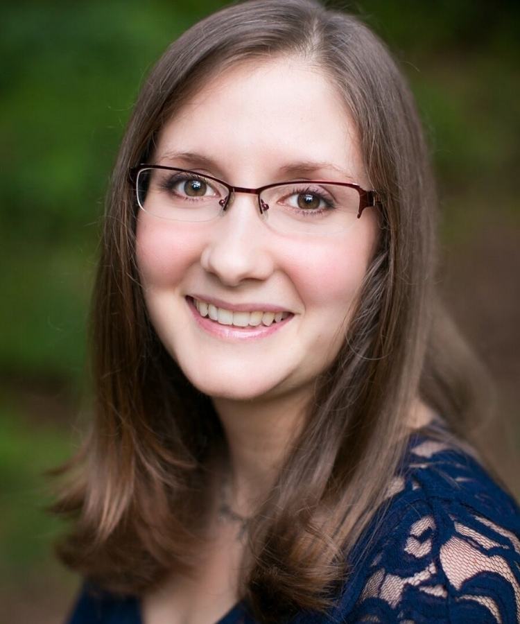 A professional headshot of author Rachael Allen, smiling warmly in a friendly and approachable portrait.